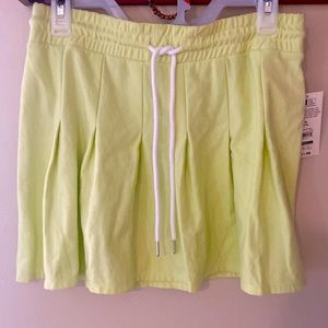 Chartreuse pleated, knit skirt